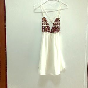 Sexy White Mini Dress with Embroidered Pattern